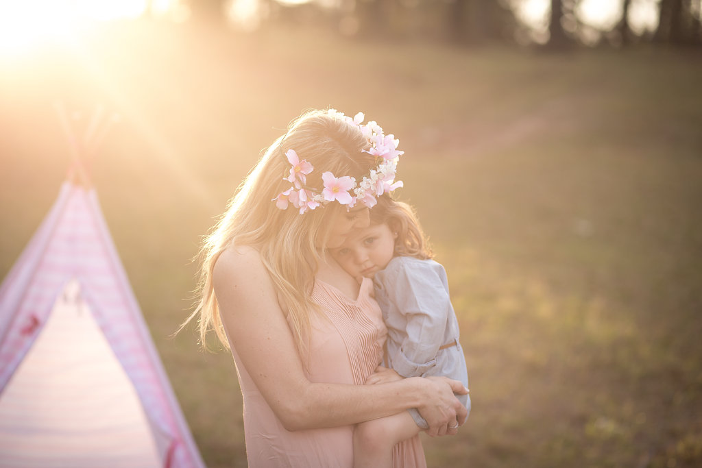 Mommy and me boho shoot with tee pee and flower crowns. That golden hour light is perfection! 