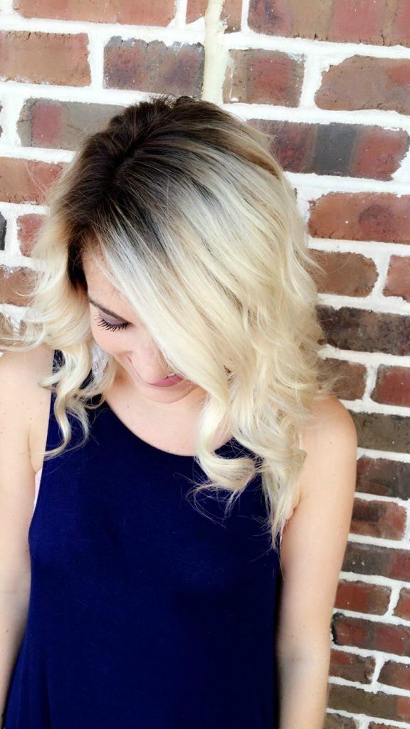 Looking for the perfect hairstyle to transition from summer to fall? Shadow roots are the perfect way to add some darker color to your blonde and give you perfect fall locks. 