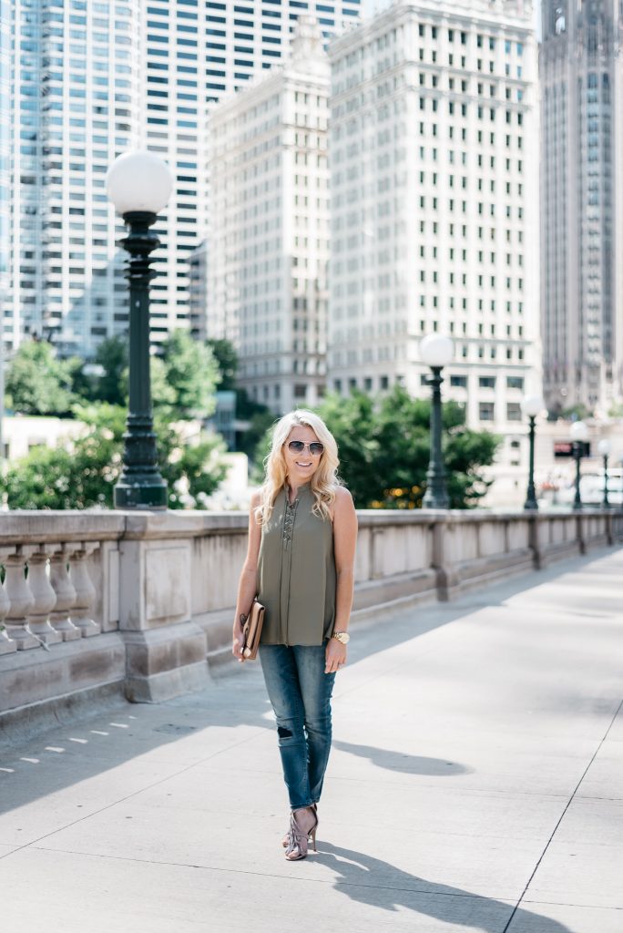 When transitioning from summer to fall with jeans it's important to mix different pieces that can balance each other. Mixing jeans with sleeveless tops and open toed shoes help keep your fall look light and airy.  Click through to see more tips! 