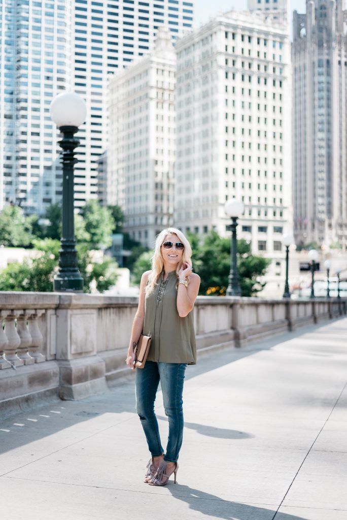 When transitioning from summer to fall with jeans it's important to mix different pieces that can balance each other. Mixing jeans with sleeveless tops and open toed shoes help keep your fall look light and airy.  Click through to see more tips! 