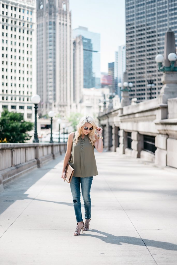 When transitioning from summer to fall with jeans it's important to mix different pieces that can balance each other. Mixing jeans with sleeveless tops and open toed shoes help keep your fall look light and airy.  Click through to see more tips! 