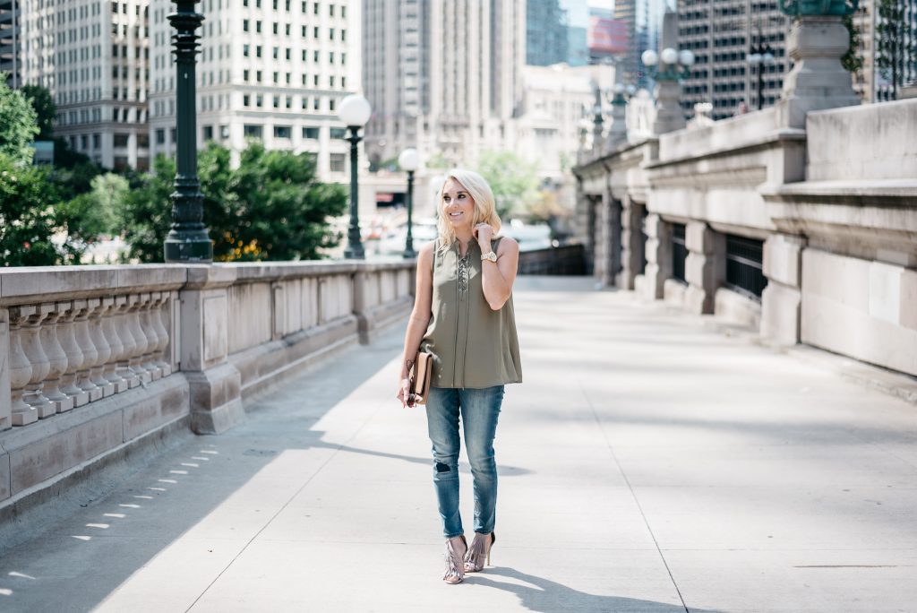 When transitioning from summer to fall with jeans it's important to mix different pieces that can balance each other. Mixing jeans with sleeveless tops and open toed shoes help keep your fall look light and airy.  Click through to see more tips! 