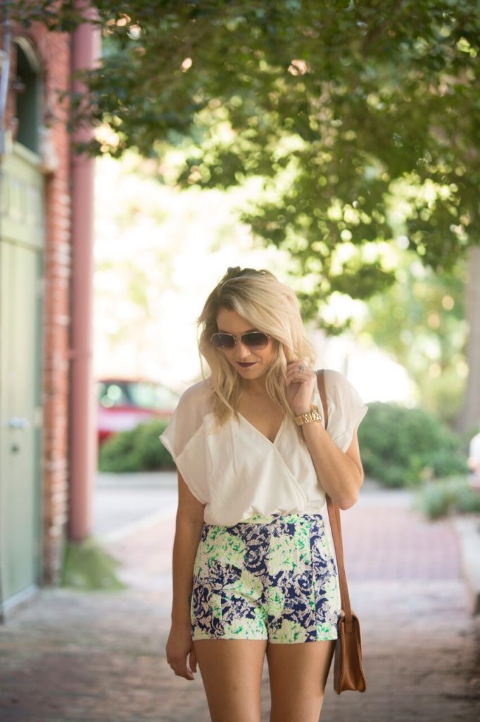 Perfect summer romper from Mo and Cho; neutrals with a pop of color. 