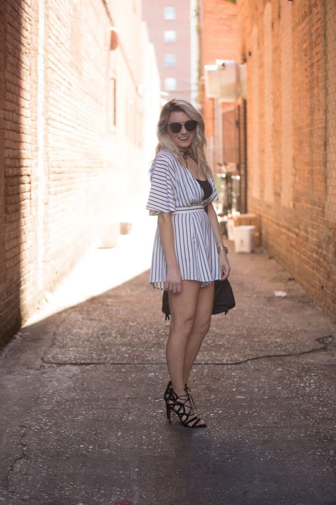 Striped romper from Mo and Cho Boutique; pair with a pair of strappy heels for the perfect nighttime look. 