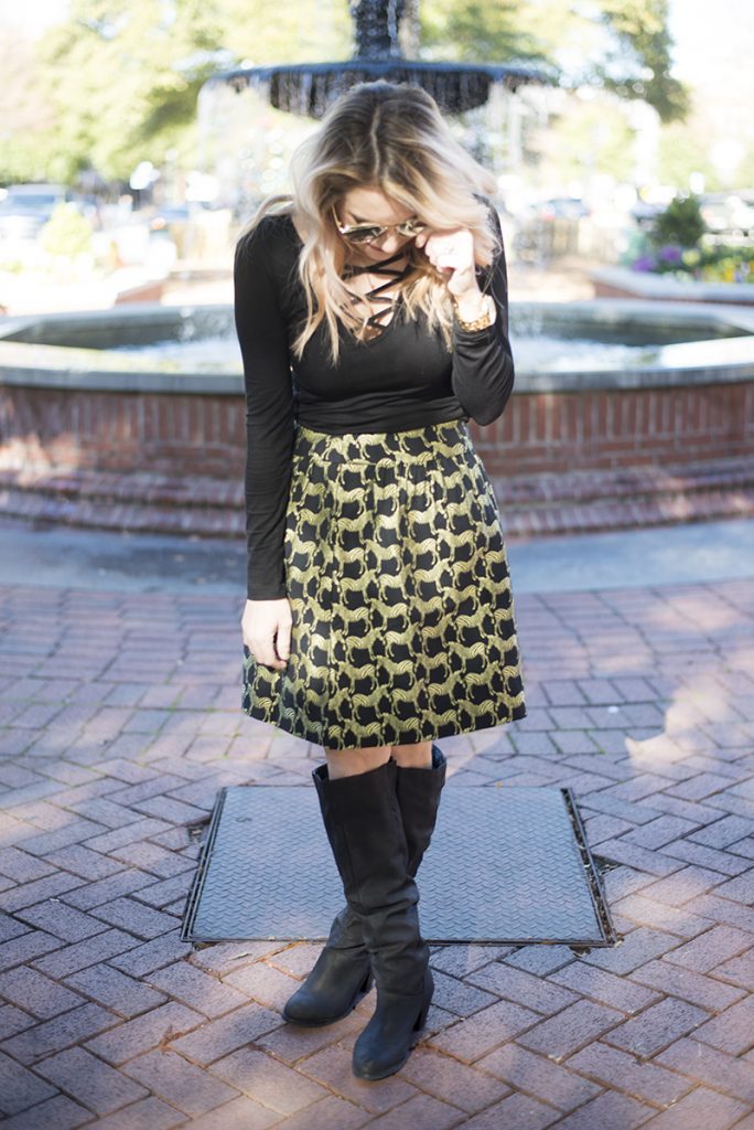 holiday outfit ideas; mix black and gold and buy pieces that you can wear all year round instead of just seasonally. This specific holiday fashion look with Crown & Ivy skirt and poncho are perfect! 