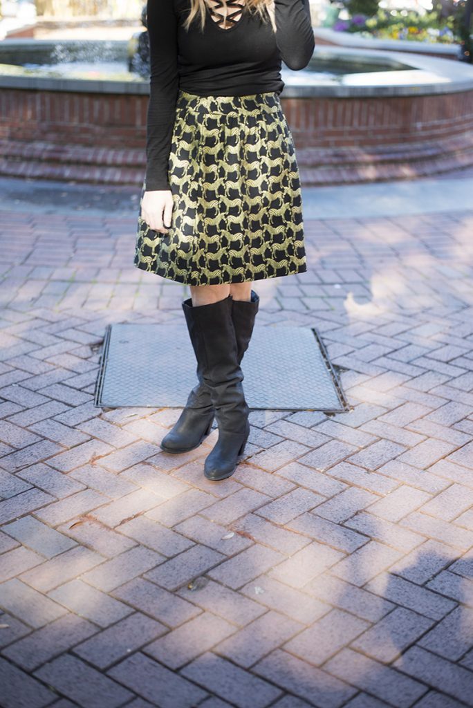 holiday outfit ideas; mix black and gold and buy pieces that you can wear all year round instead of just seasonally. This specific holiday fashion look with Crown & Ivy skirt and poncho are perfect! 