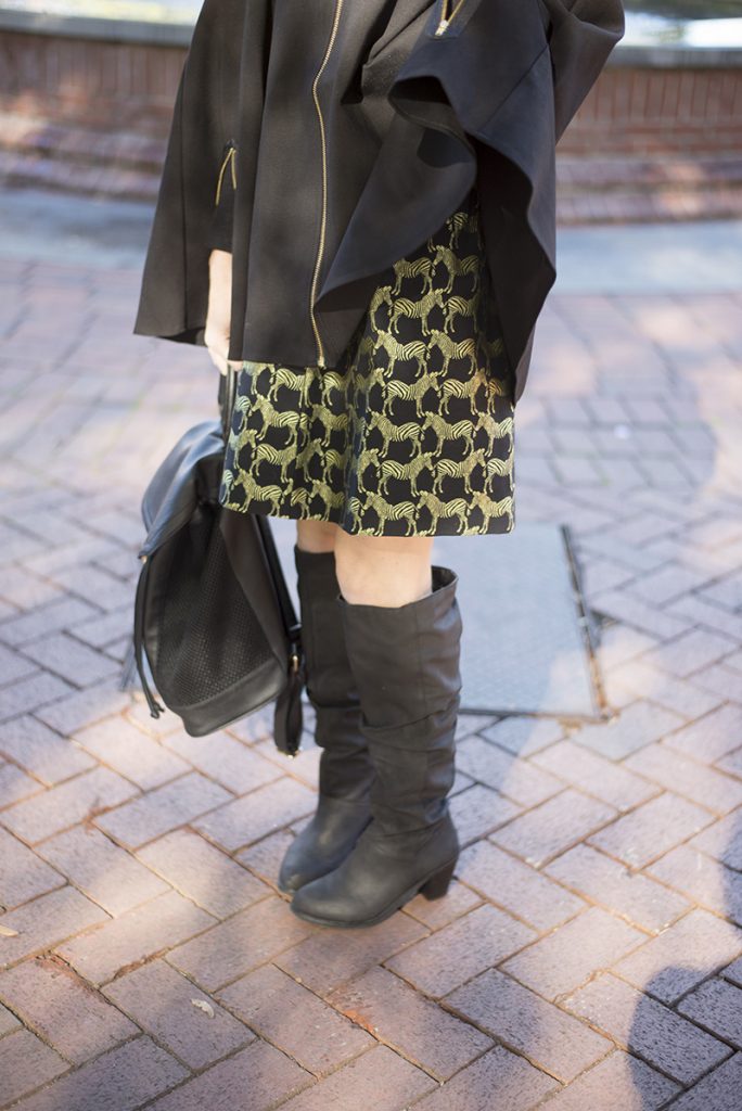 holiday outfit ideas; mix black and gold and buy pieces that you can wear all year round instead of just seasonally. This specific holiday fashion look with Crown & Ivy skirt and poncho are perfect! 