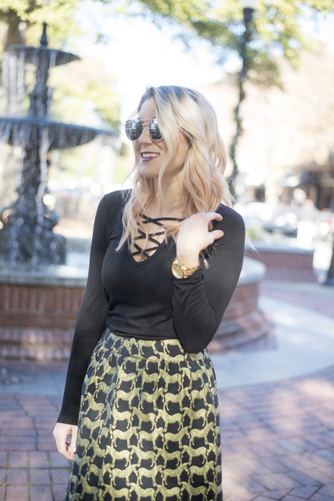 holiday outfit ideas; mix black and gold and buy pieces that you can wear all year round instead of just seasonally. This specific holiday fashion look with Crown & Ivy skirt and poncho are perfect! 