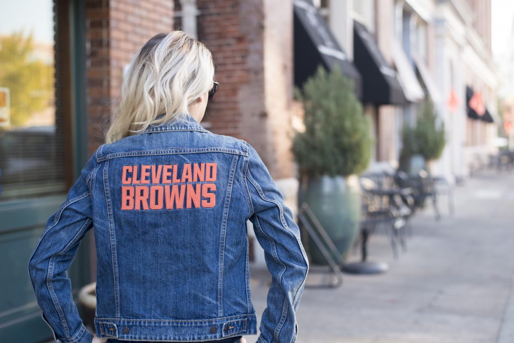Fall fan style featuring a Cleveland Browns jean jacket from Levis. No need to stick with the boring and mundane jersey when you can get creative and still sport your team gear! 
