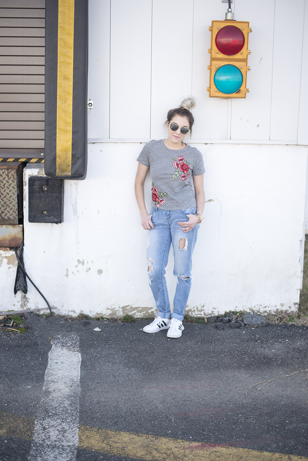 Embroidered roses tee paired with jeans and tennis for a comfortable but chic daytime look. 