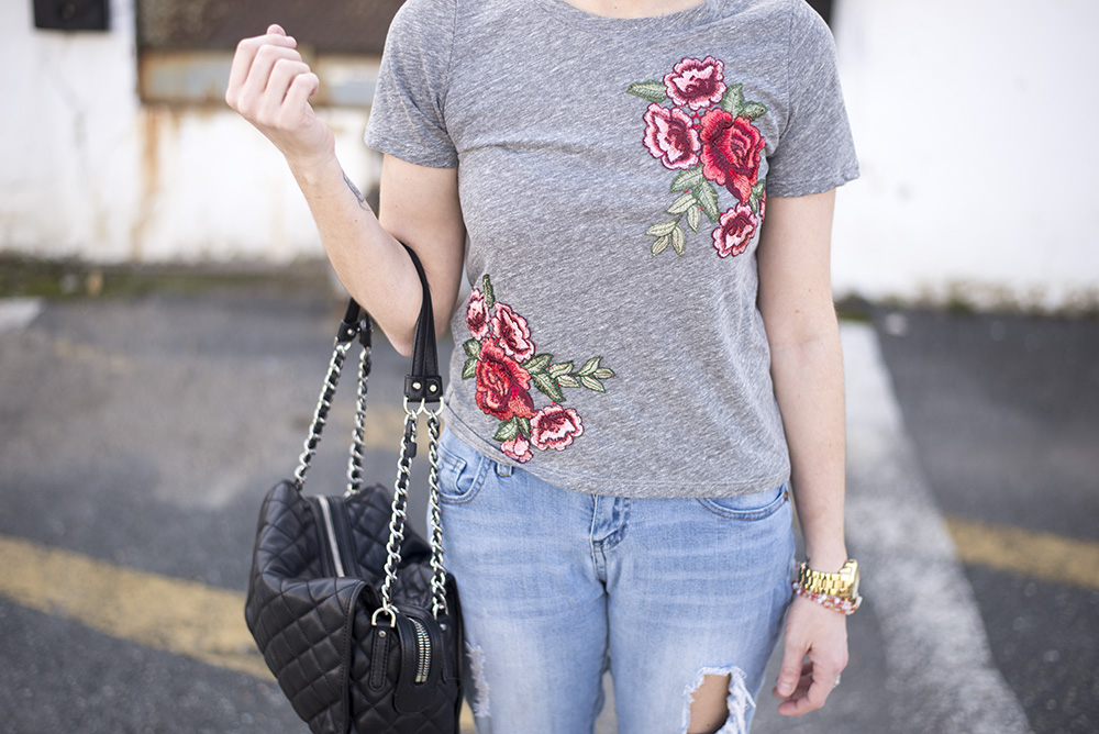 Embroidered roses tee paired with jeans and tennis for a comfortable but chic daytime look. 