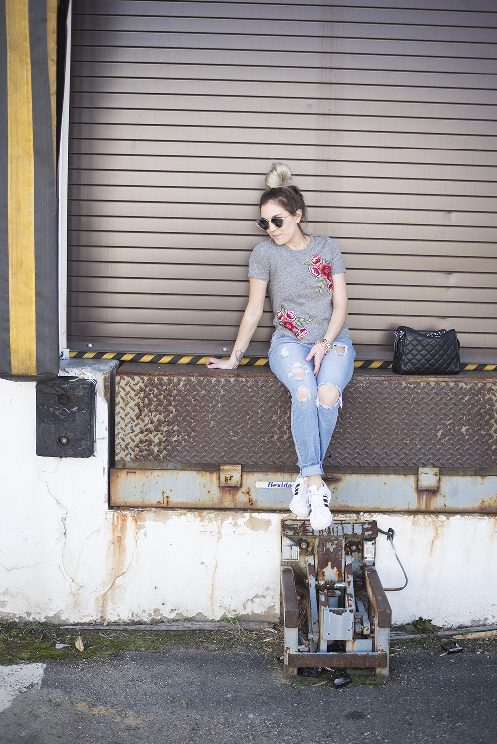 Embroidered roses tee paired with jeans and tennis for a comfortable but chic daytime look. 