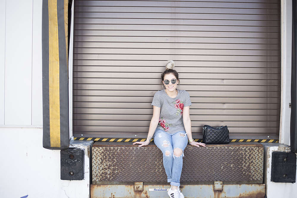 Embroidered roses tee paired with jeans and tennis for a comfortable but chic daytime look. 