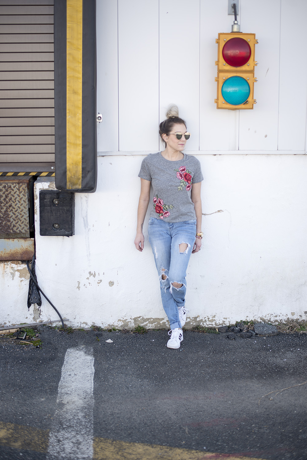 Embroidered roses tee paired with jeans and tennis for a comfortable but chic daytime look. 