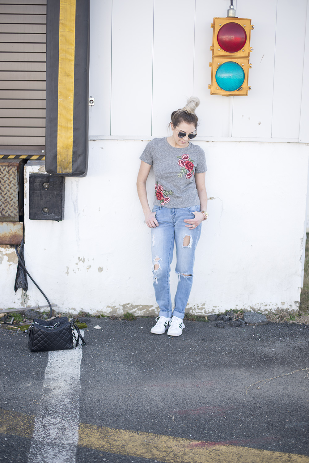 Embroidered roses tee paired with jeans and tennis for a comfortable but chic daytime look. 