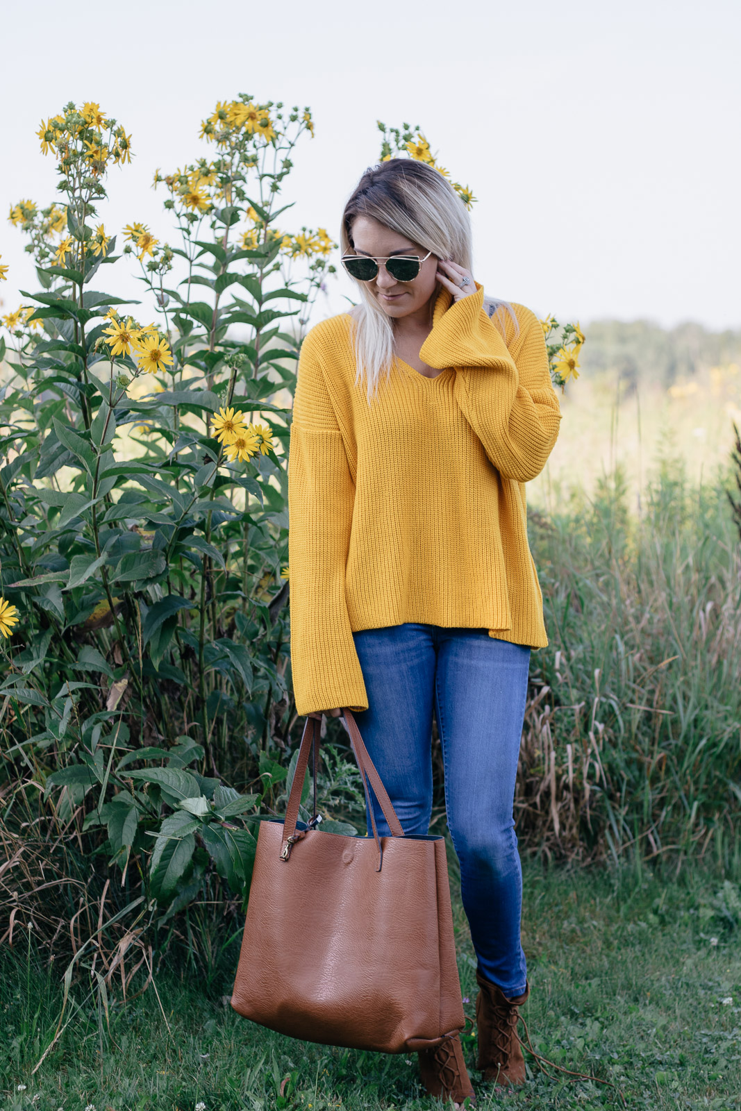 Fall vibes: mustard oversized sweater with suede lace up booties. 