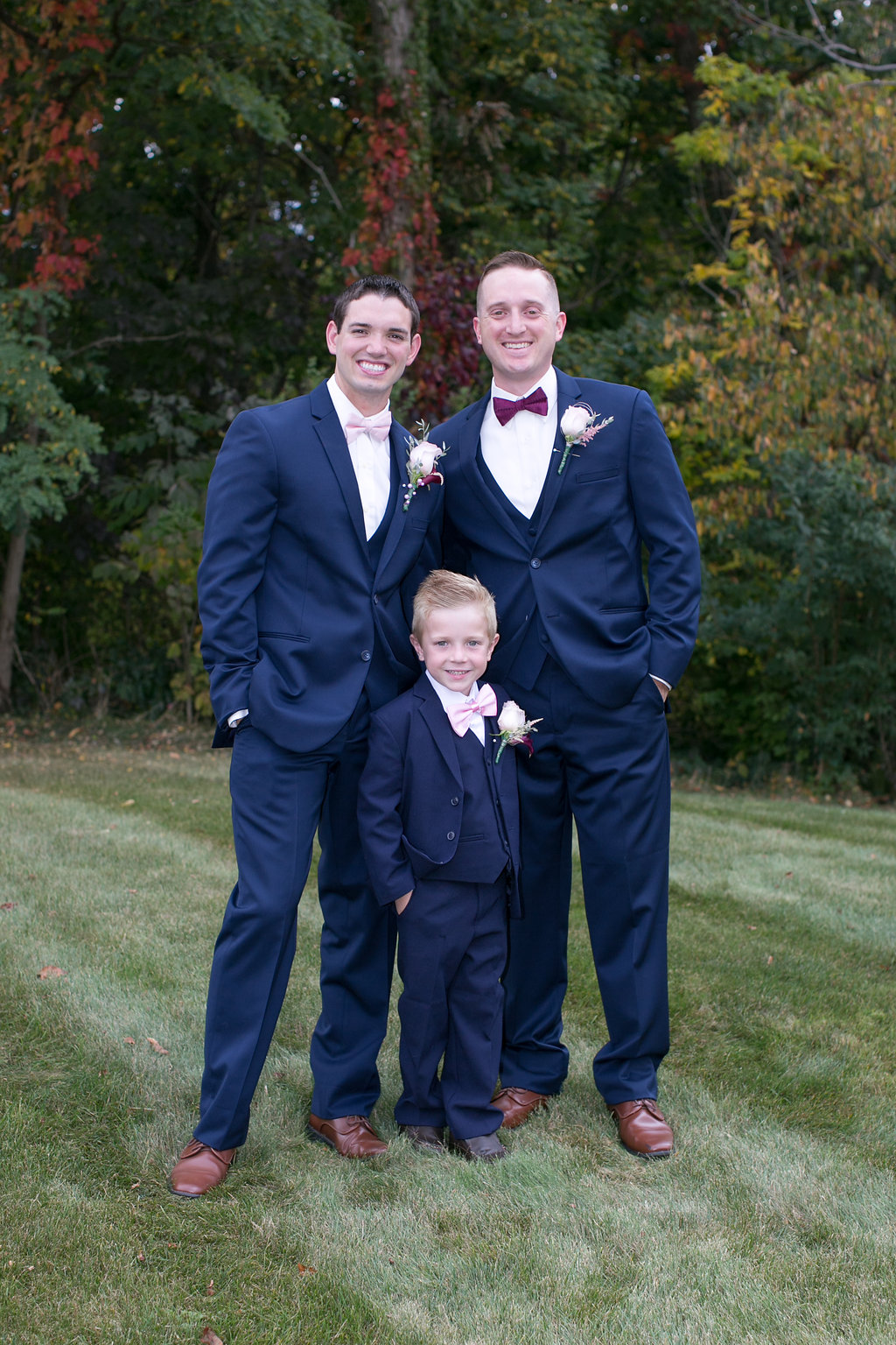 A perfect fall wedding; groom and groomsmen in navy and bordeaux 