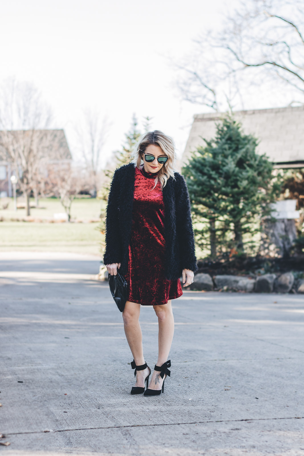 Red velvet dress with black accents for the holidays. 