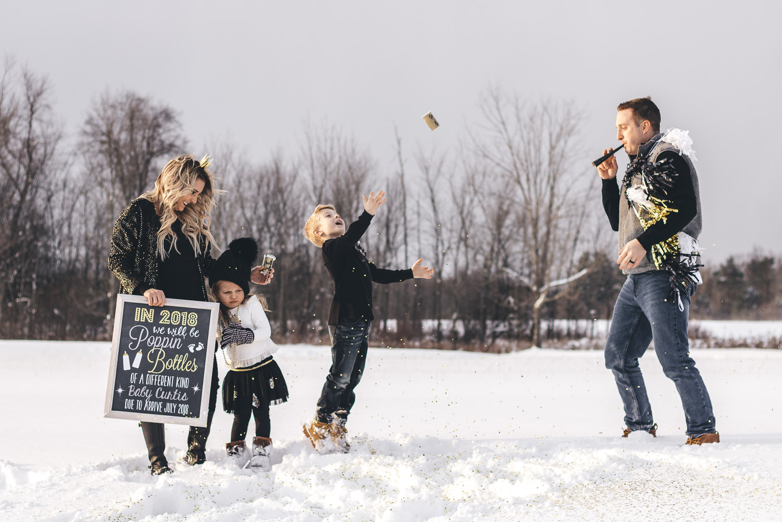 New Year's Eve Pregnancy Announcement with confetti