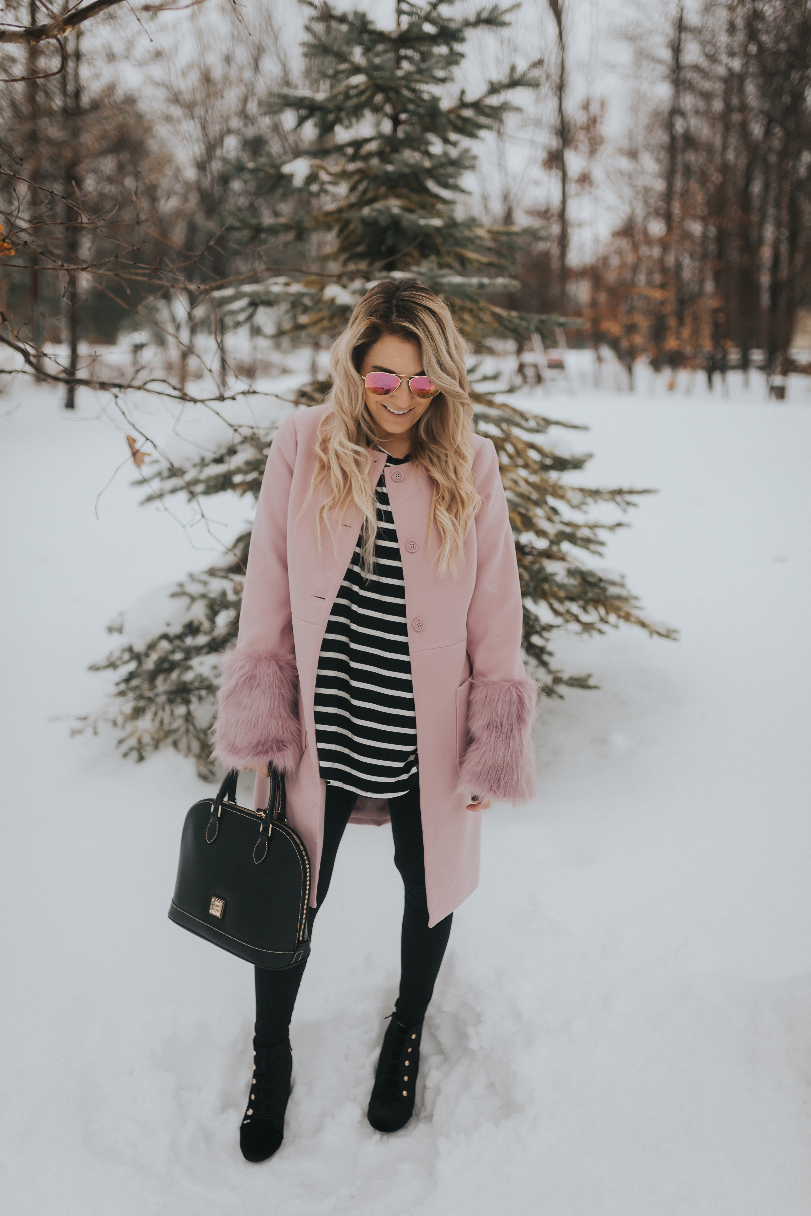 winter style: pastel jacket with black striped top and leggings