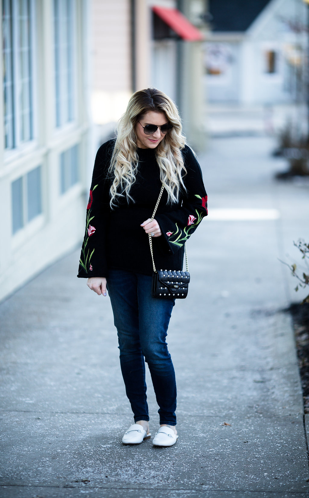 An embroidered floral sweater is the perfect way to transition your wardrobe from winter to fall! 