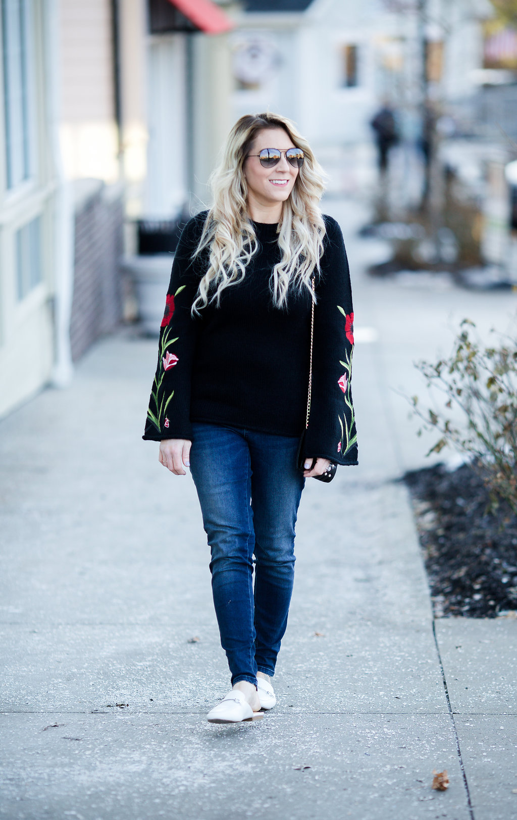 An embroidered floral sweater is the perfect way to transition your wardrobe from winter to fall! 