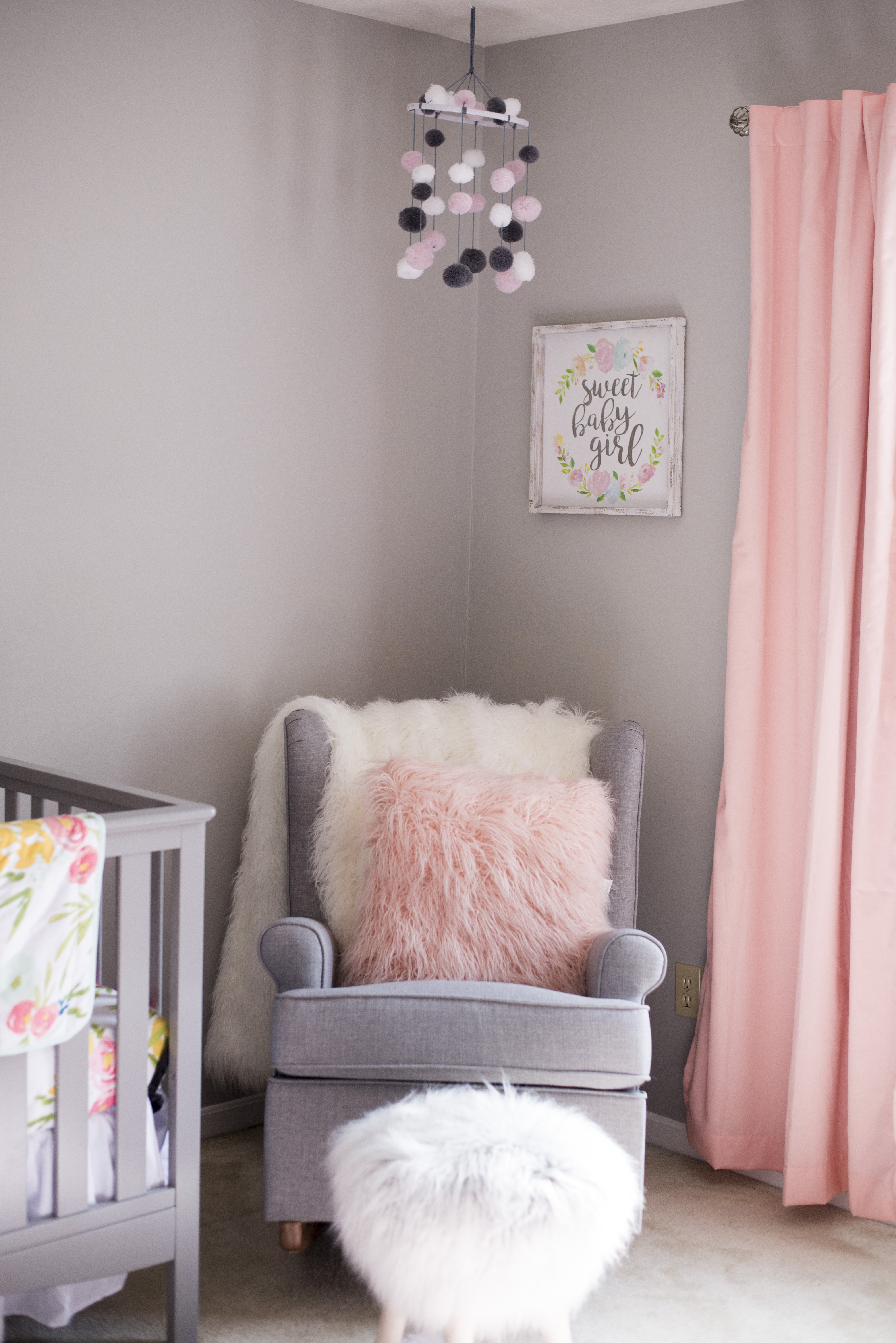 Cozy reading corner in the baby nursery